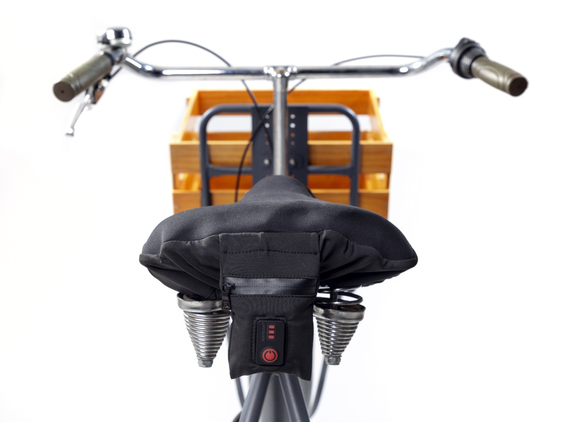 Vyhrievaný poťah sedla cestovného bicykla
